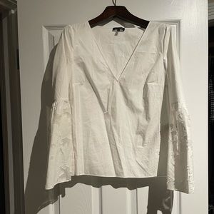 Mossimo Duti blouse with embellished sleeves.